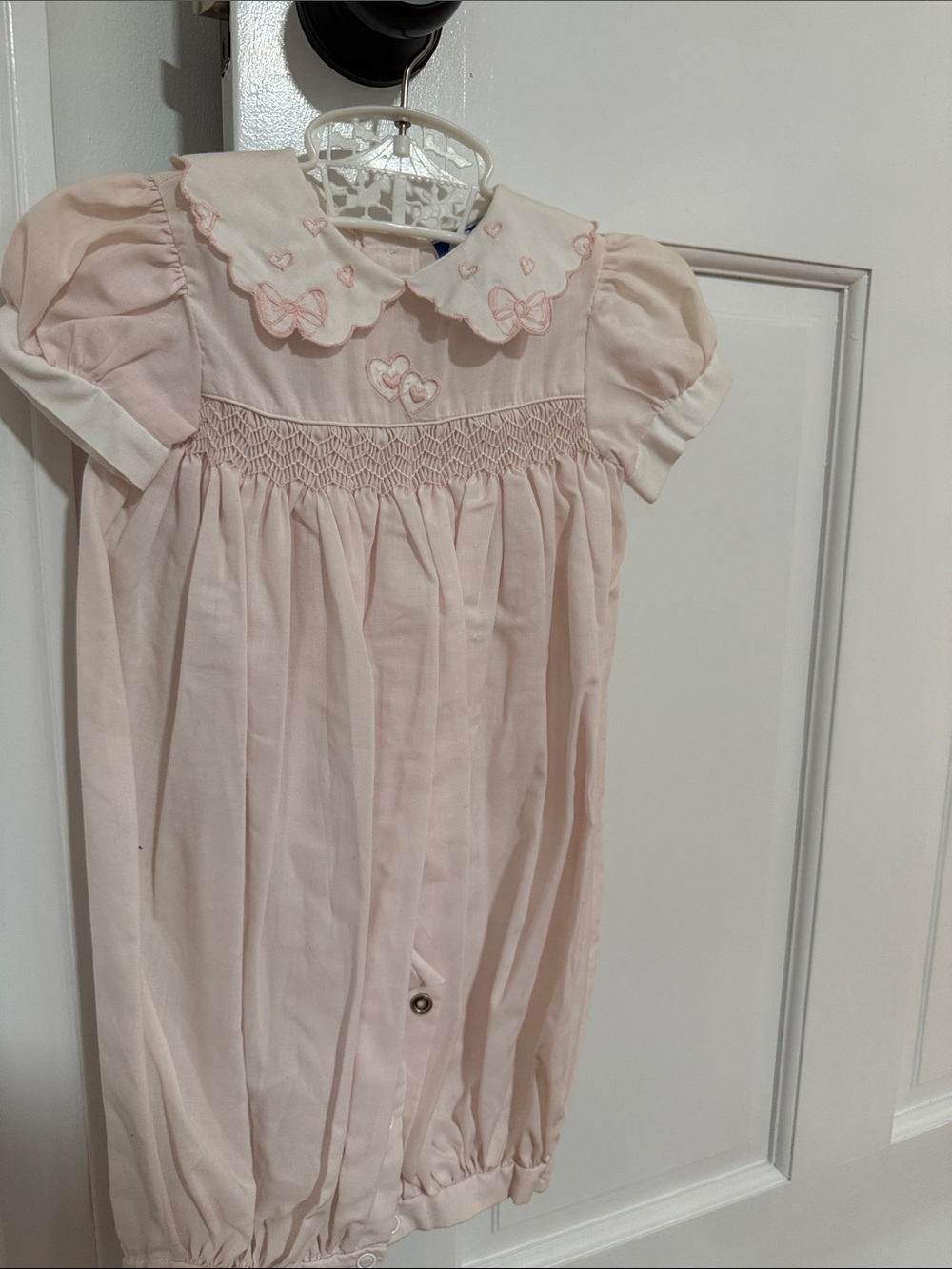 Carriage Boutique Pale Pink Smocked One-Piece Bodysuit